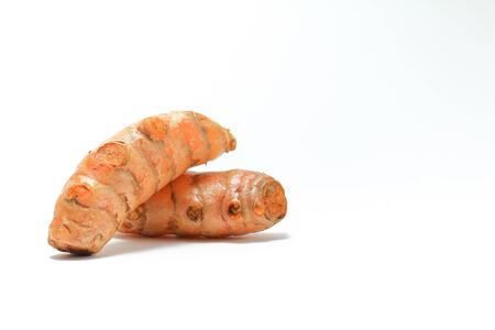 Aromatic plant spice turmeric root Curcuma Longa isolated on white backgroundの写真素材