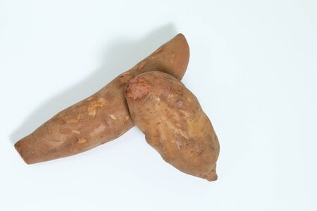 Yacon root (Smallanthus sonchifolius) close up, isolated on white backgroundの写真素材