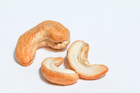 Cashews, cashew nuts (Anacardium occidentale) isolated on white backgroundの写真素材