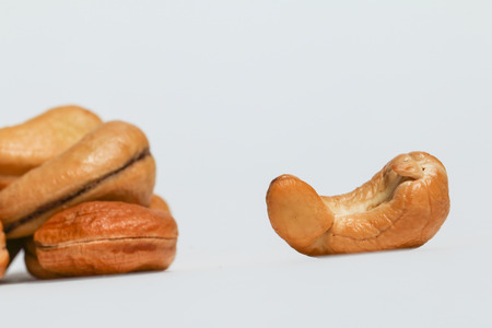 Cashews, cashew nuts (Anacardium occidentale) isolated on white backgroundの写真素材