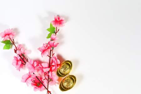 Chinese New Year decoration of cherry blossoms and yuan baoの写真素材