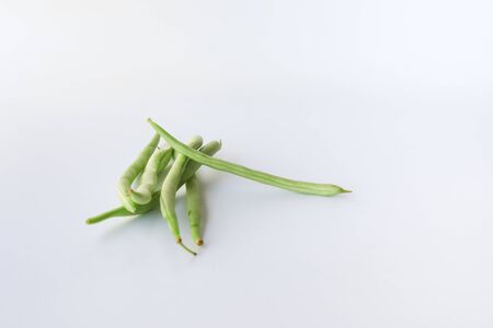 Snap beans (Phaseolus Vulgaris) isolated on white, group of green beansの写真素材