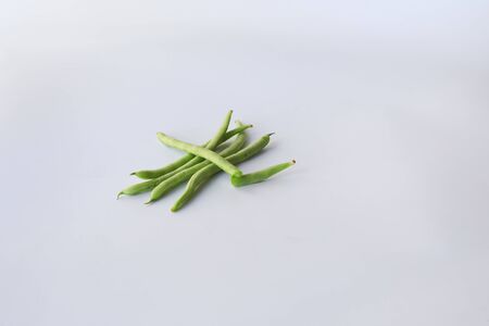Snap beans (Phaseolus Vulgaris) isolated on white, group of green beansの写真素材