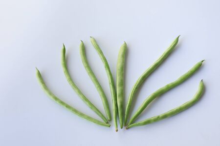 Snap beans (Phaseolus Vulgaris) isolated on white, group of green beans