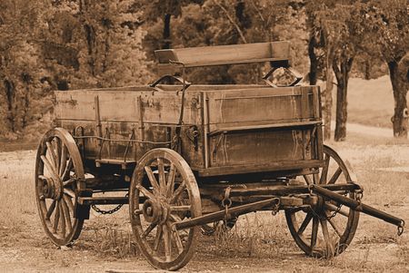An old covered wagon in sepiaの写真素材