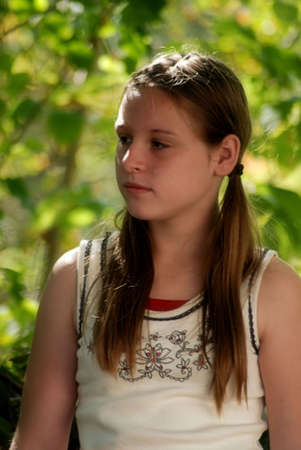An outdoor portrait of a beautiful young girl