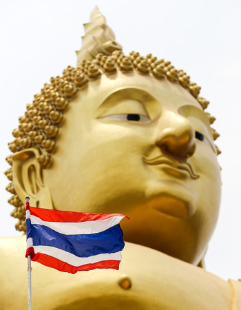 thailand frag with golden bhuda face backgroundの写真素材