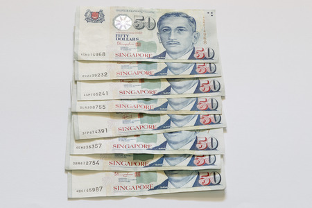 Singapore 100 dollars bank note in stackの写真素材