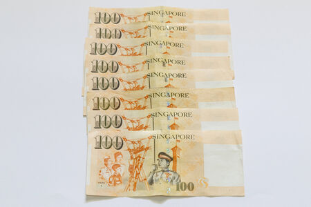 Singapore 100 dollars bank note in stackの写真素材