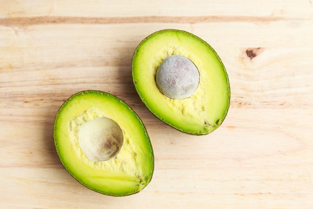 Avocados on wood