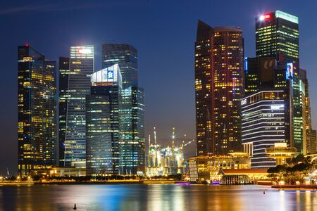 Buildings in Singapore city in night scene background , Singapore - 17 Jan 2015のeditorial素材