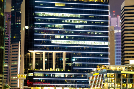 windows office building at nightの写真素材