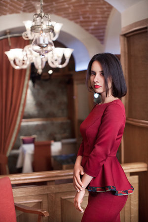 woman in beautiful classic stylish clothes in the interiorの写真素材