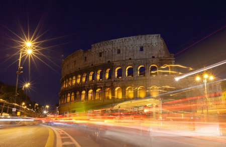 rome, italy, colosseum old ancient building gladiator battle at nightのeditorial素材