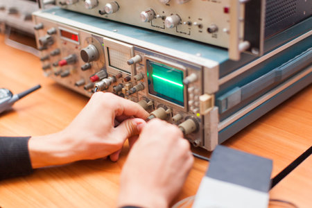 engineers work with electrical measuring devices