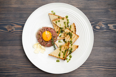 delicious dish of eggs and minced meat in a restaurantの写真素材