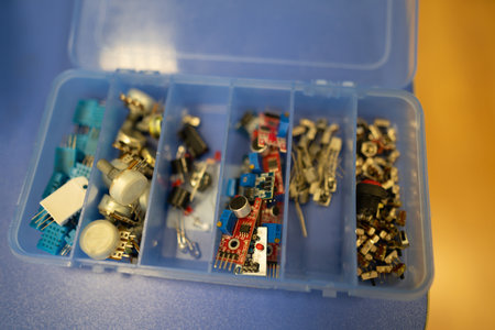 engineers assemble electrical circuits from radio components in a laboratory