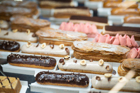 various delicious sweet pastries in the shop window