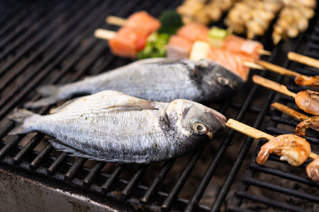 close up taste of grilled fishの写真素材