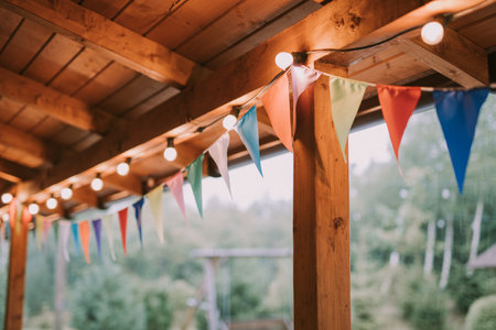 the house is decorated with flags and lights for the party