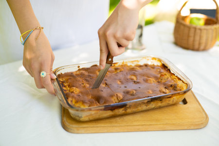 close-up of pie cut into pieces with a knife