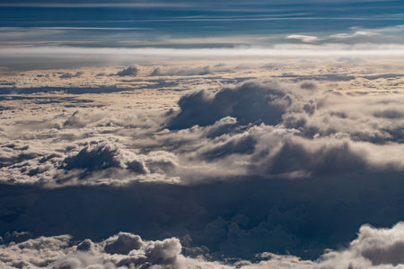 beautiful fluffy clouds from the window of the plane