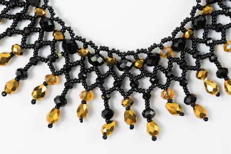 handmade colorful bead necklace close-up isolated on white backgroundの写真素材