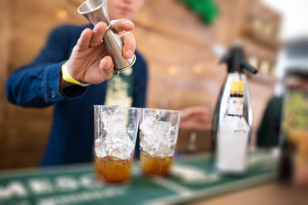 bartender makes an alcoholic cocktailの写真素材