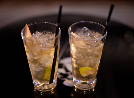 beautiful and delicious alcoholic cocktails prepared at the bar by the bartender