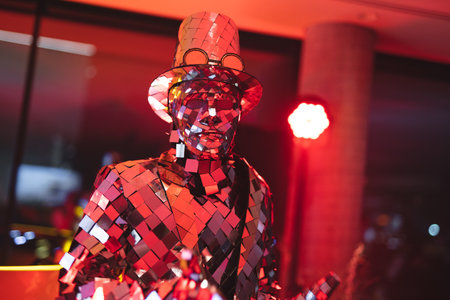 people animator in a mirror suit at a party