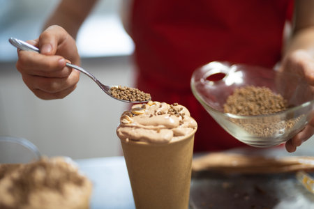 the pastry chef bakes delicious cookies and dessertsの写真素材