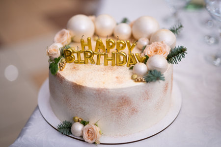 birthday cake with candles in the shape of letters