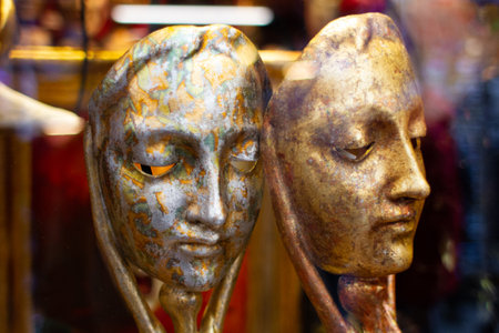 beautiful two realistic Venetian masks in golden colorの写真素材