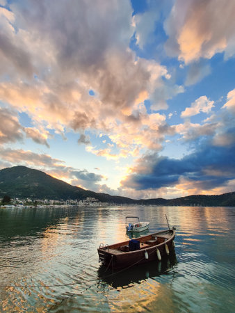 beautiful ships and boats are moored near the shore