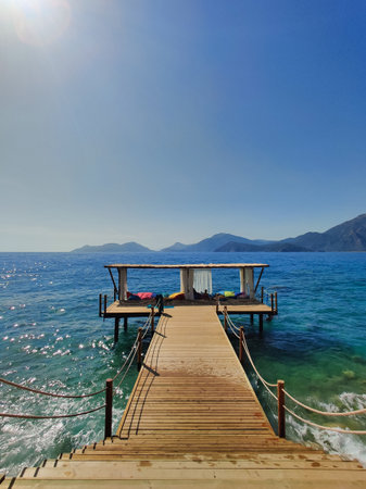 beautiful bungalows for relaxation in the middle of the water with a path from the beachの写真素材