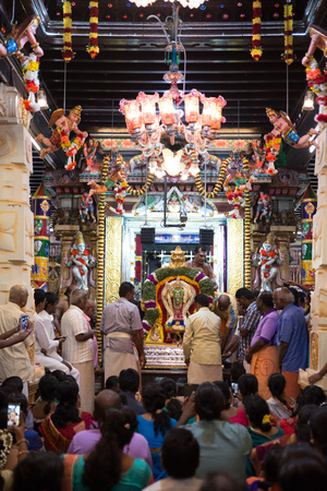 GEORGETOWN, PENANG/MALAYSIA ?? CIRCA FEB 2017: Devotees gather in the Nattukotai Chettiar Temple worship lord Muruga during Thaipusam.のeditorial素材