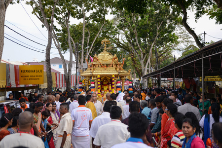 GEORGETOWN, PENANG/MALAYSIA ?? CIRCA FEB 2017: Devotees accompany golden chariot during procession during Thaipusam festivalのeditorial素材