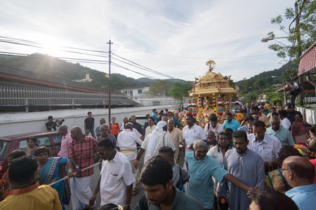 GEORGETOWN, PENANG/MALAYSIA ?? CIRCA FEB 2017: Devotees and the gold chariot along the pilgrimage route during Thaipusam.のeditorial素材