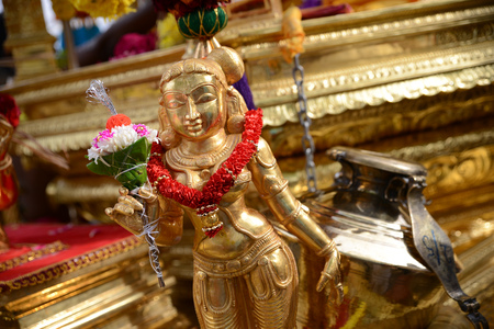 GEORGETOWN, PENANG/MALAYSIA ?? CIRCA FEB 2017: A gold statue of gold chariot with the colorful flower hand on the neck during thaipusam.のeditorial素材