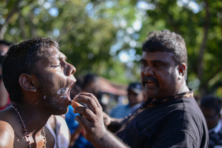 Georgetown,Penang.Malaysia â CIRCA JAN 2016: Piercing of flesh by supporter during Thaipusam Festival.のeditorial素材