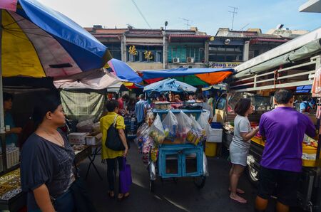 George Town, Penang/Malaysia - Jun 18 2016: Blue trishaw with bakery and Benggali roti bread seller at the street.のeditorial素材