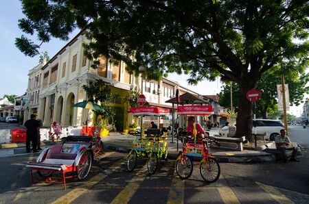 George Town, Penang/Malaysia - Jul 07 2016: Rishshaw park at the road wait for passenger.のeditorial素材