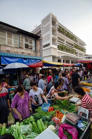 George Town, Penang/Malaysia - Aug 07 2016: People but vegetables at morning market. Background is Chowrasta bazaar.のeditorial素材