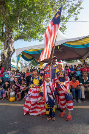 George Town, Penang/Malaysia - Aug 31 2017: Malaysian wear Malaysia flag costume celebrate national day together.のeditorial素材
