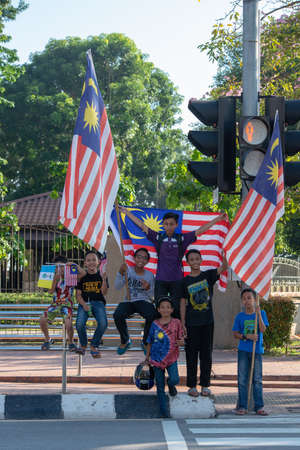 George Town, Penang/Malaysia - Aug 31 2017: Patriotic kids enjoy national day celebration.のeditorial素材