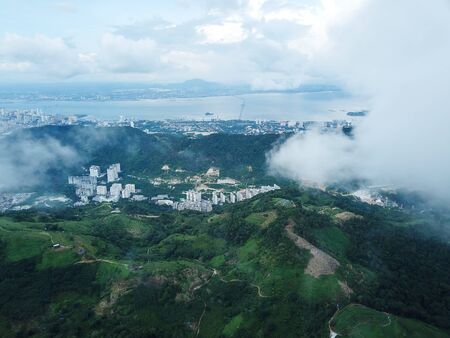 Aerial view green nature Penang plantation over Paya Terubongの写真素材