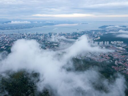 Aerial view sea cloud move toward Penang George Town in cloudy morning.の写真素材