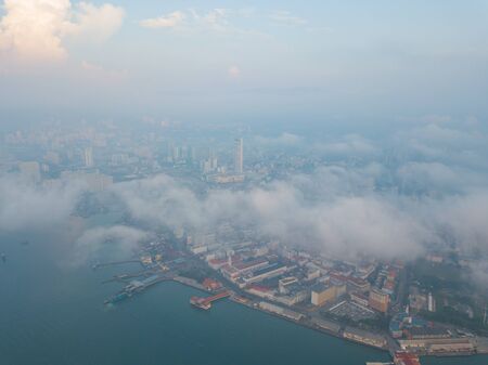 Aerial view UNESCO Georgetown Heritage site in early morning over sea cloud.の写真素材
