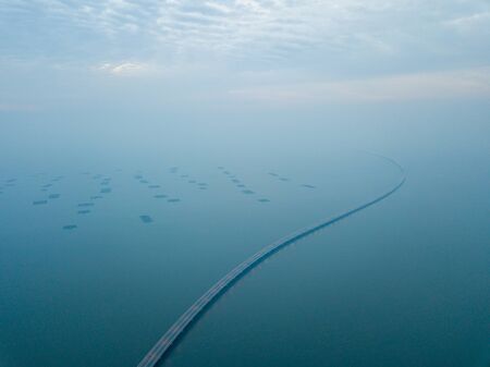 Aerial view Penang second bridge in dusk hour in haze.の写真素材
