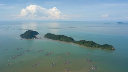Aerial view fish farm near Pulau Aman and Pulau Gedong in sunny day.の写真素材
